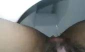 Shaved girl pooping in close up