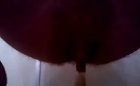 Mature man pooping in close up