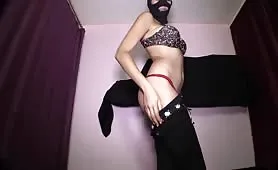 Pierced girl shitting on white napkin