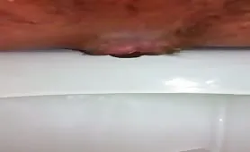 Mature man shitting in close up