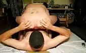 Babe with saggy tits pooping on her slave