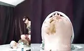 Beautiful mistress shitting on male slave