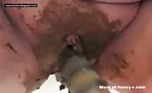 Dildoing her pussy