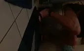 Black guy shitting over toilet