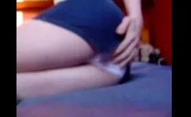 Blonde Woman Lifts Her Jeans and Pisses on the Bed in Her Panties