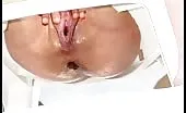 Milf shitting over toilet