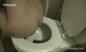 Chick shits over toilet