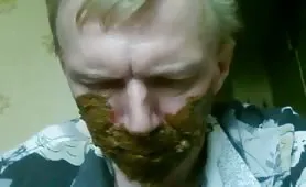 Smearing poop on slave's face