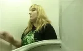 Blonde babe shitting in public bathroom