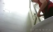 Mature babe shitting in public bathroom