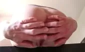 Fingering pussy while pushing a big one