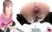 Shaved babe shitting pushing big turd