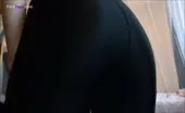 Big turd in black yoga pants