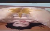 Shitting on her own face