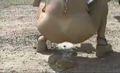 Tattooed babe shitting