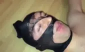 Dark haired babe feeds slave