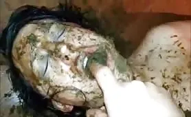 She smears shit on hairy pussy