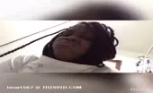 Dark haired ebony shits over toilet