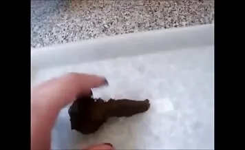 Woman shits through blue jeans and tramples with feet