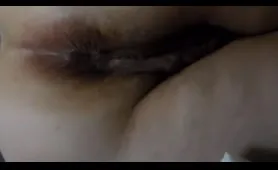 Fat woman pulls string from pussy and squirts on bed