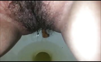 Hairy mexican girl pooping