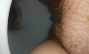 Hairy babe shitting