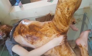 Dark haired teen masturbates with a lot of shit