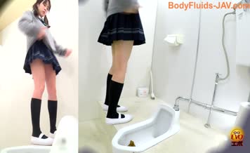 Hot schoolgirl using public toilet