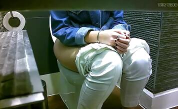Natural brunette shits in toilet