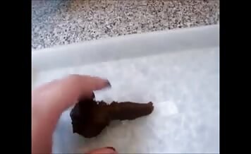 Woman shits through blue jeans and tramples with feet