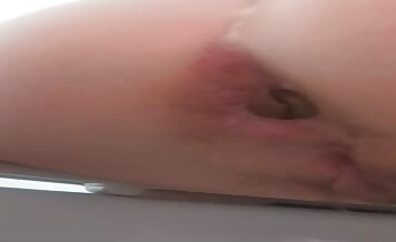 Woman shits in a gaping hole